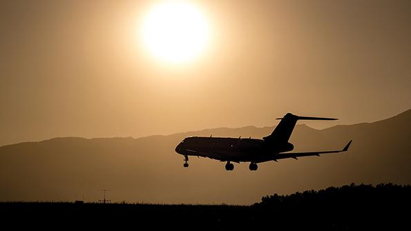 Aircraft flying below the sun