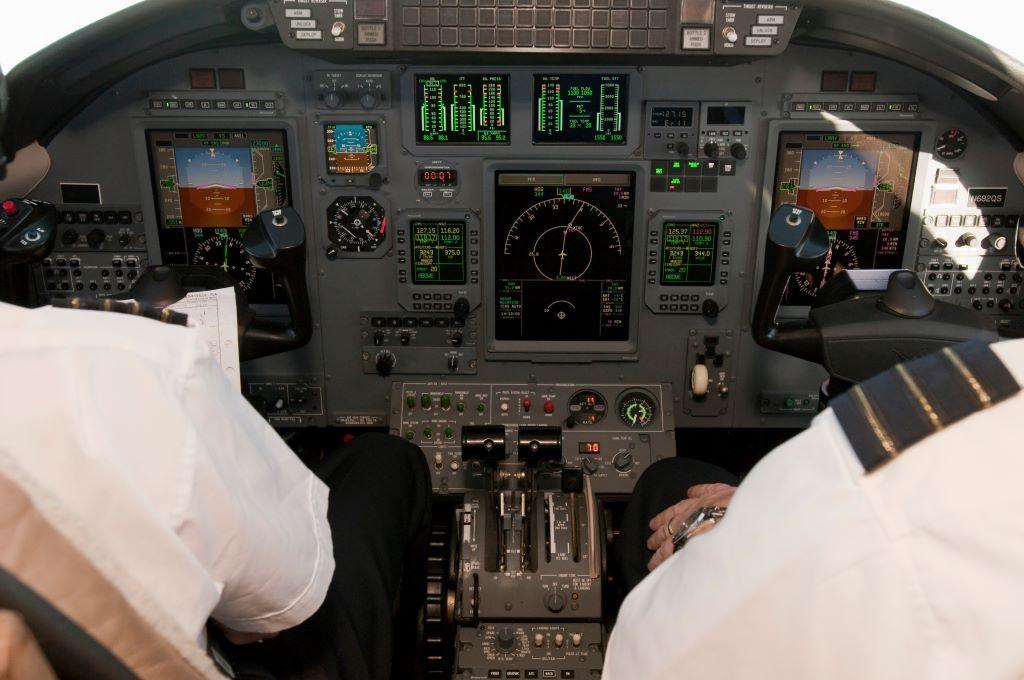 pilots in cockpit